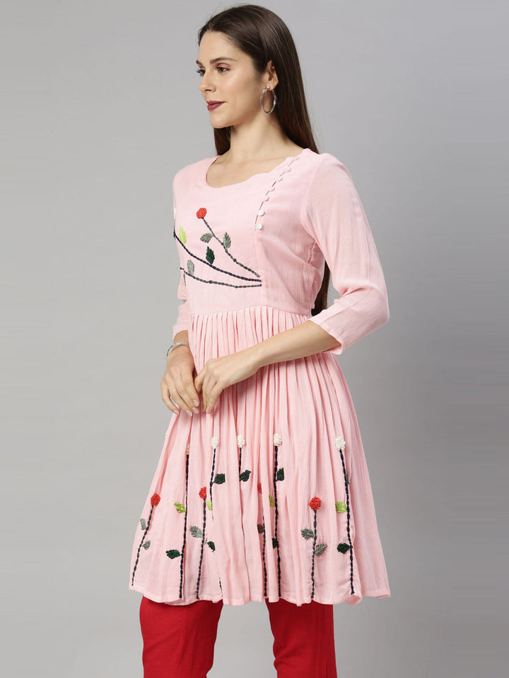 Neerus Pink rayon thread embroidered kurti - back view
