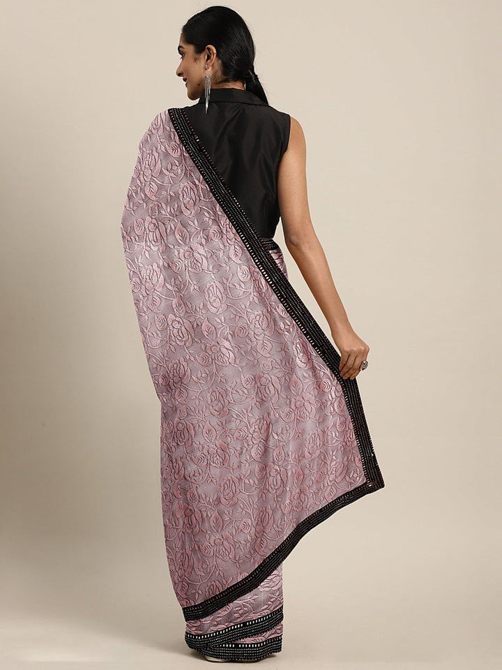 Neerus Orange georgette woven saree - back view