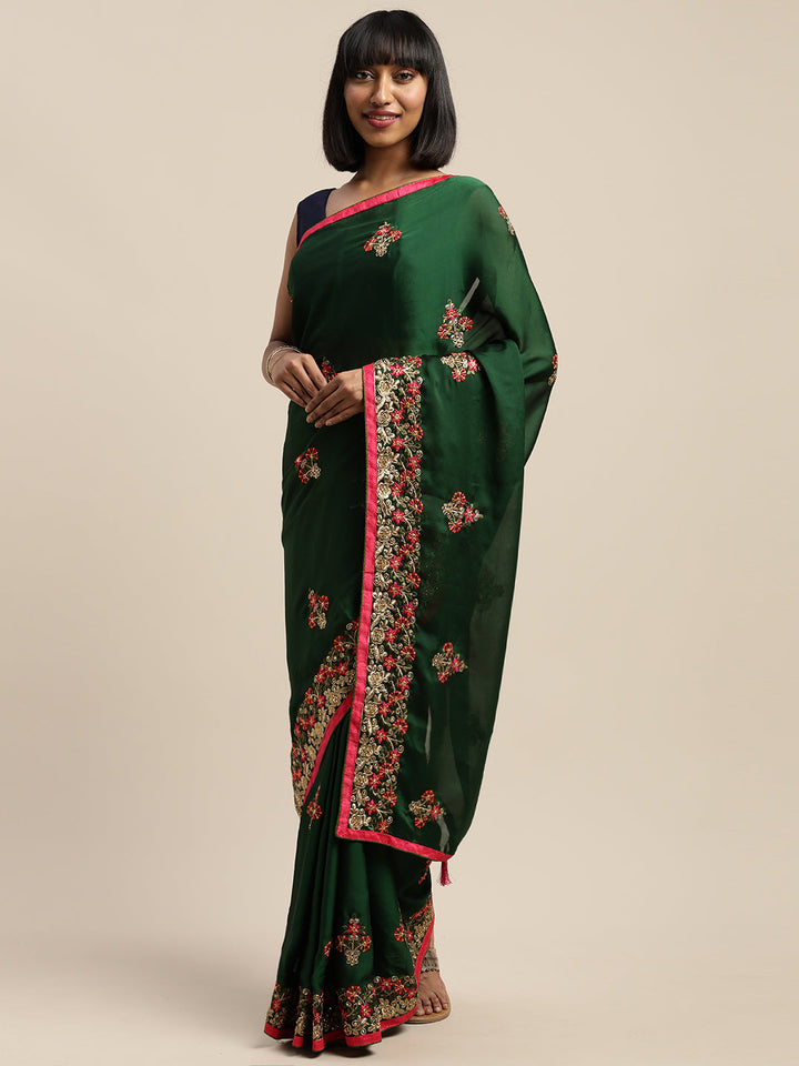 Neerus Green crepe embroidered saree with blouse - front view