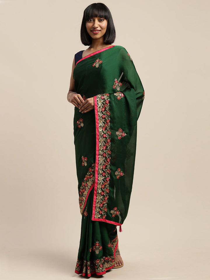 Neerus Green crepe embroidered saree with blouse - back view