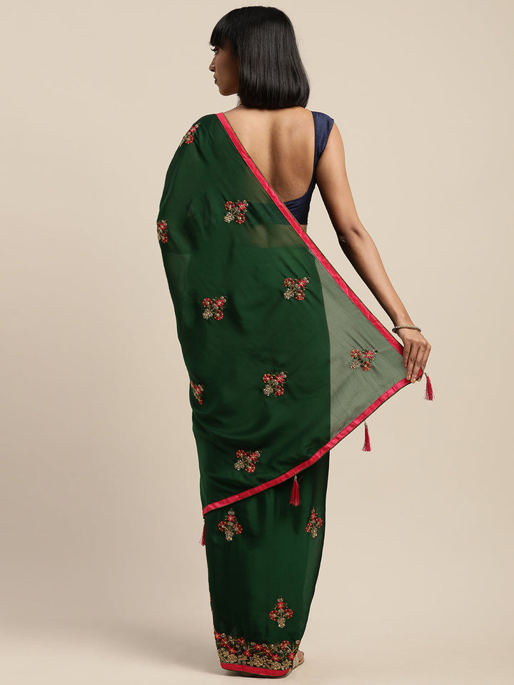 Neerus Green crepe embroidered saree with blouse - side view