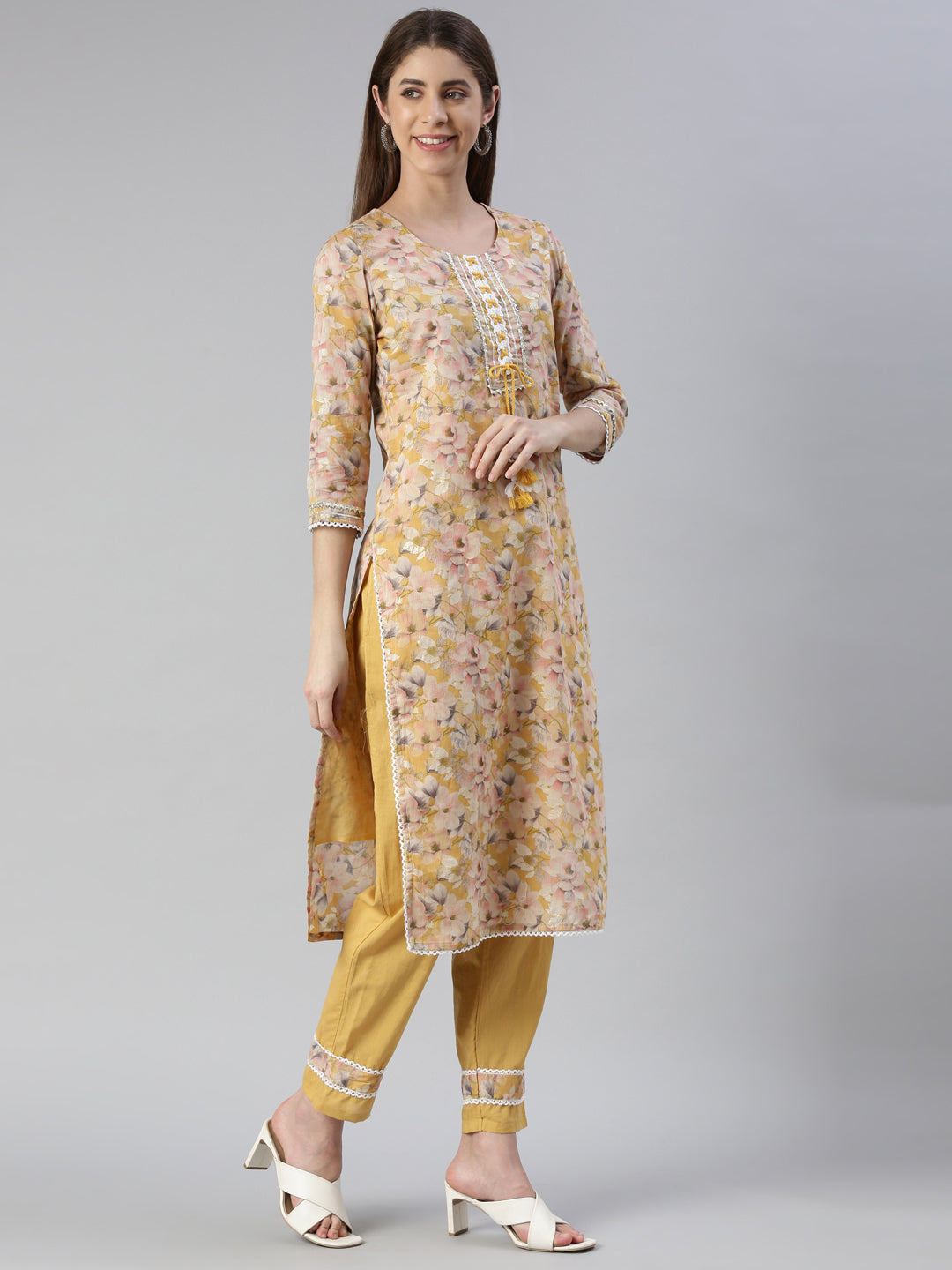 Neerus Yellow printed straight kurta set with trouser and dupatta - back view