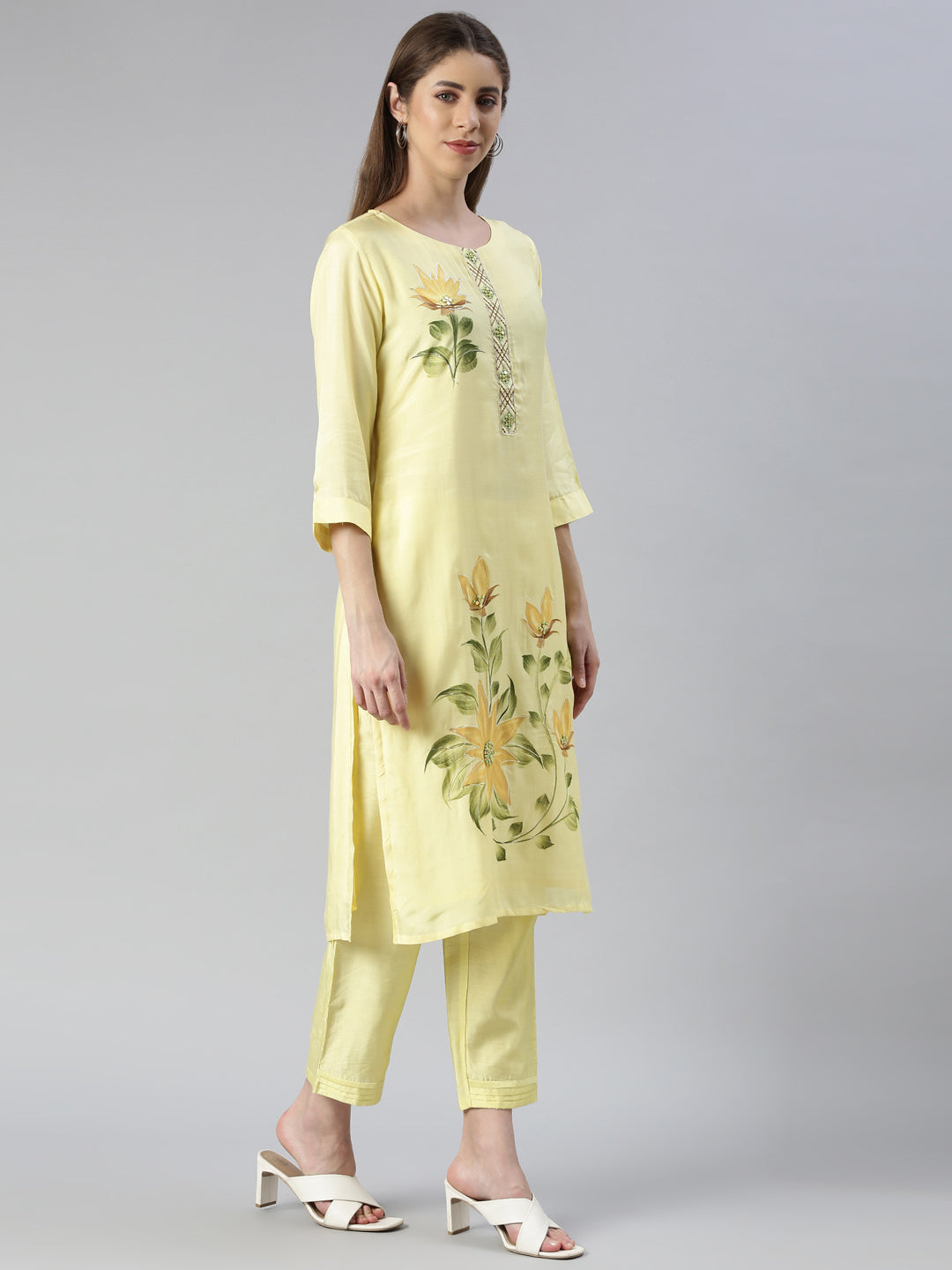 Neerus Yellow printed kurta set with trouser and dupatta - back view