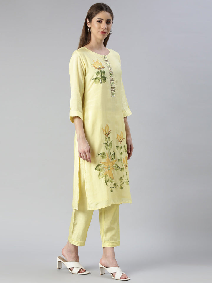 Neerus Yellow printed kurta set with trouser and dupatta - back view