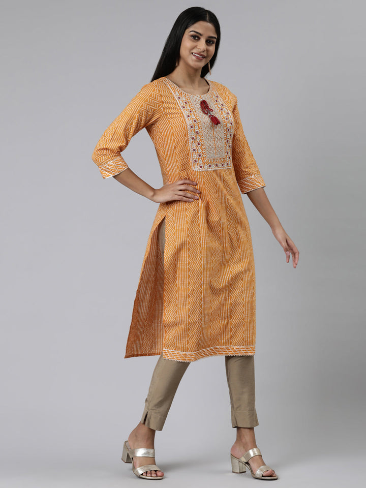 Neerus Yellow cotton printed straight kurti - back view