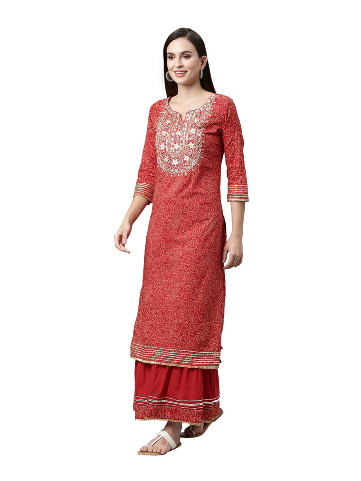 Neerus Red printed ethnic suit set with skirt and dupatta - back view