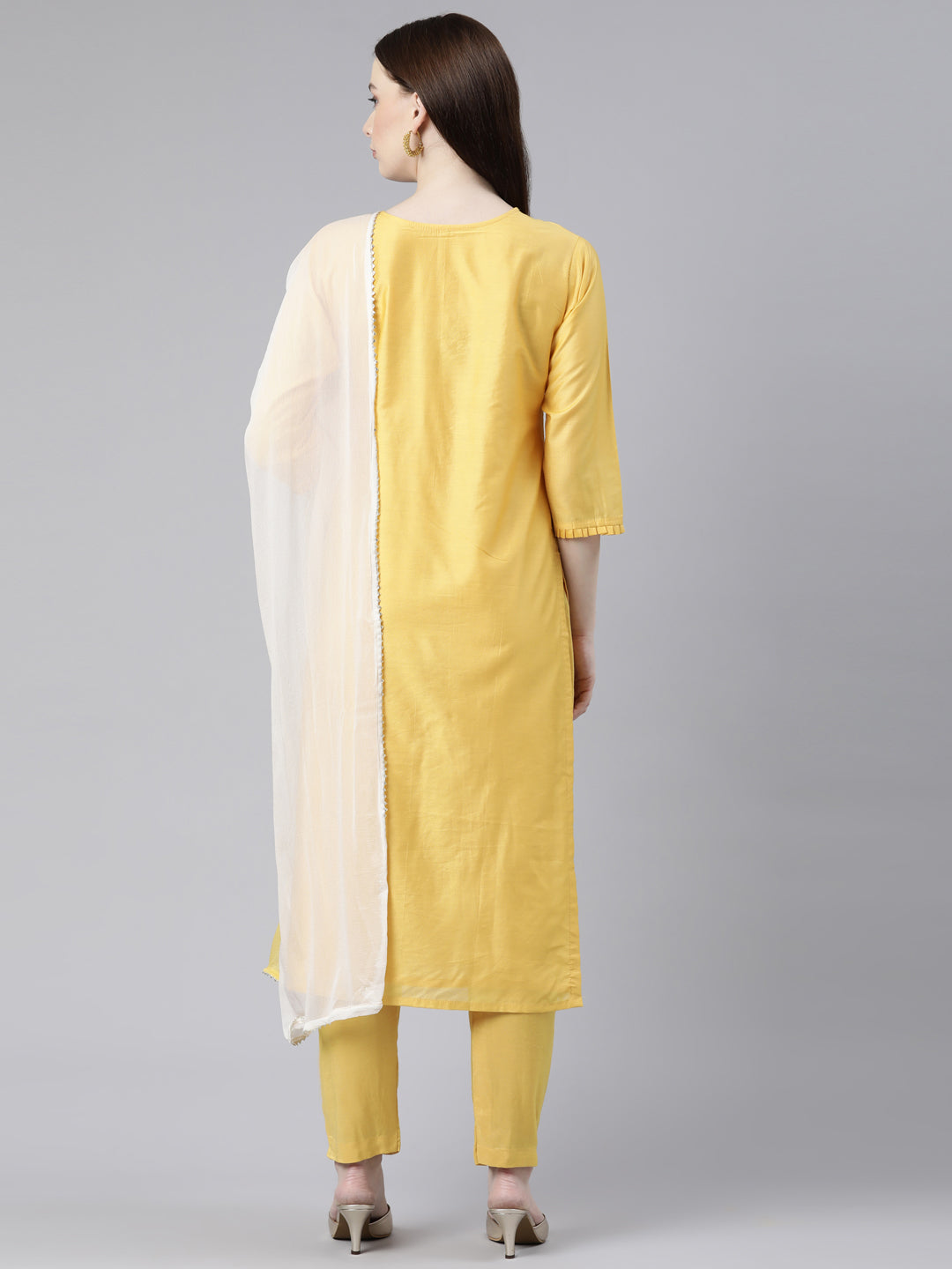 Neerus Yellow cotton solid kurta set with trouser and dupatta - side view