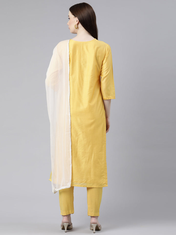 Neerus Yellow cotton solid kurta set with trouser and dupatta - side view