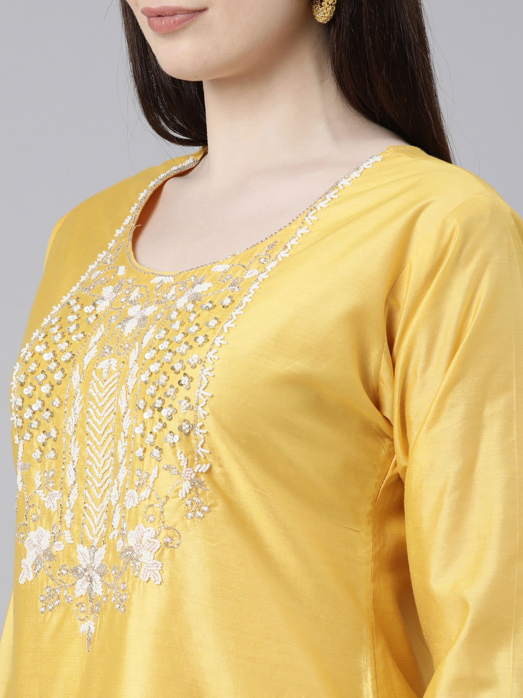 Neerus Yellow cotton solid kurta set with trouser and dupatta - detail view 1