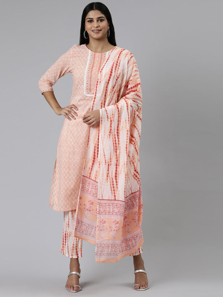 Neerus Orange cotton printed kurta set with trouser and dupatta - front view