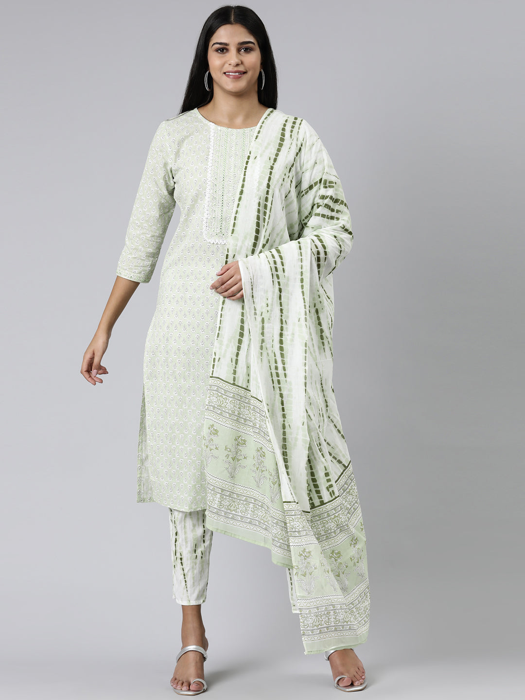 Neerus Green cotton printed kurta set with trousers and dupatta - front view