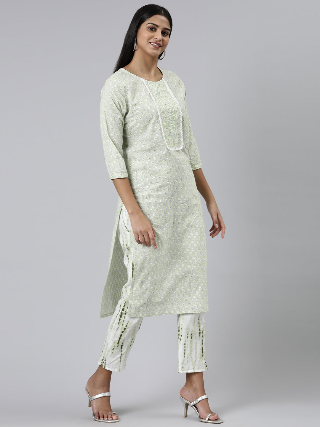Neerus Green cotton printed kurta set with trousers and dupatta - back view