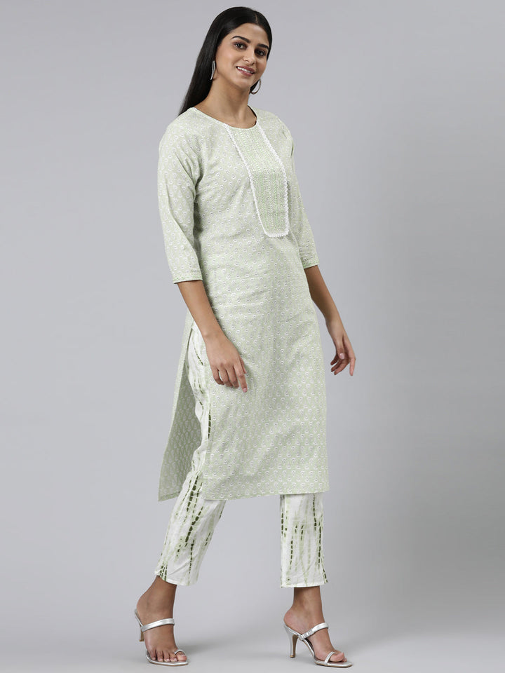 Neerus Green cotton printed kurta set with trousers and dupatta - back view