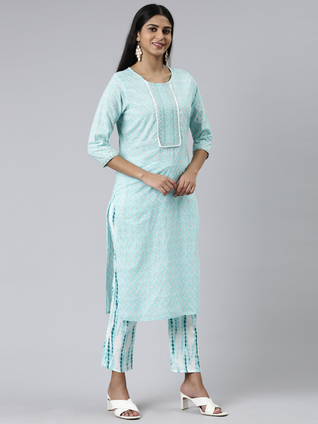 Neerus Green cotton printed kurta set with trouser and dupatta - back view