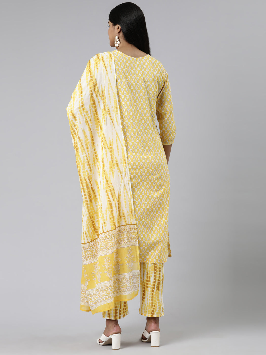 Neerus Yellow cotton printed kurta set with trouser and dupatta - side view