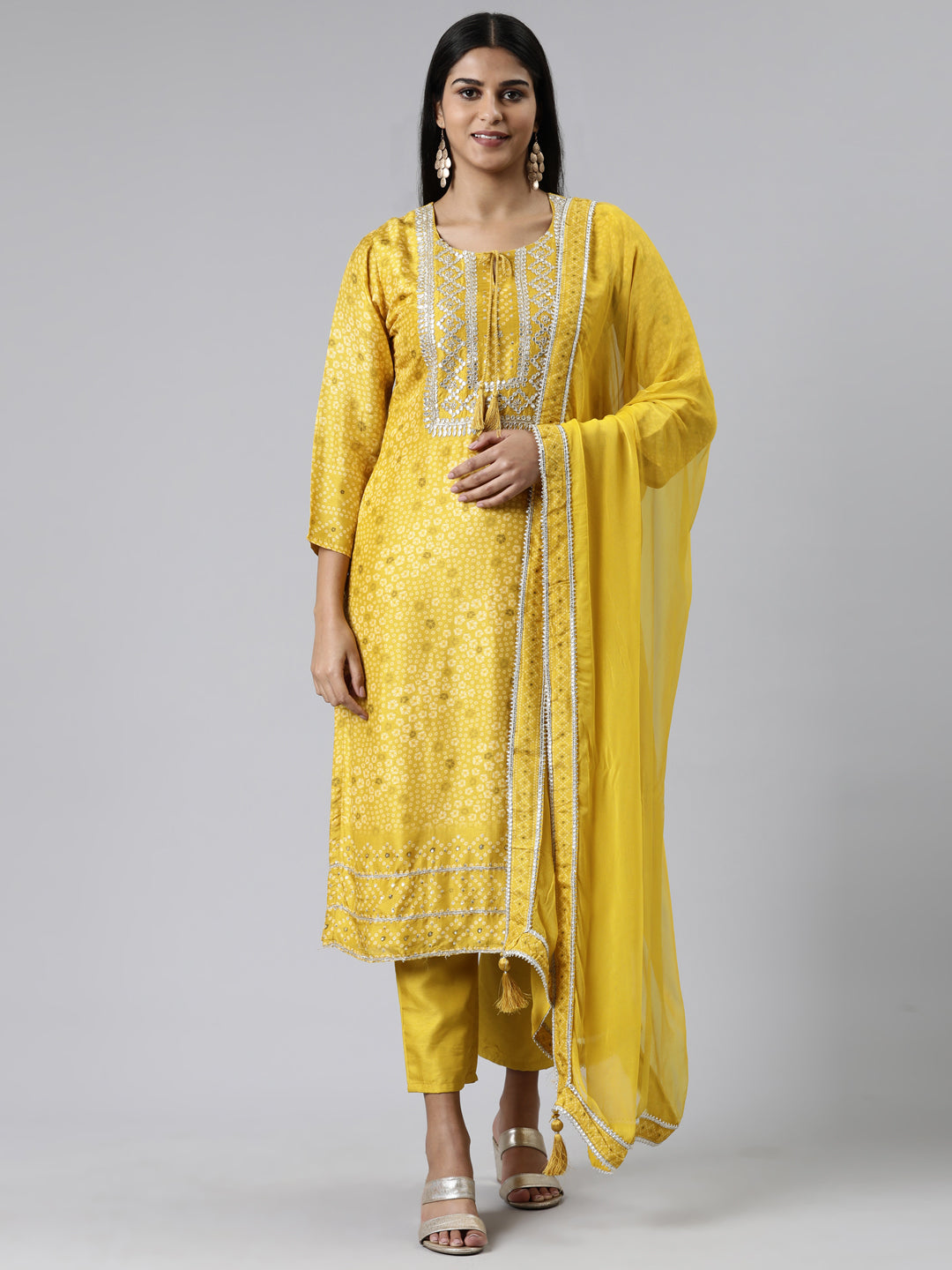 Neerus Yellow cotton printed kurta set with trouser and dupatta - front view