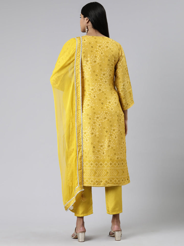 Neerus Yellow cotton printed kurta set with trouser and dupatta - side view