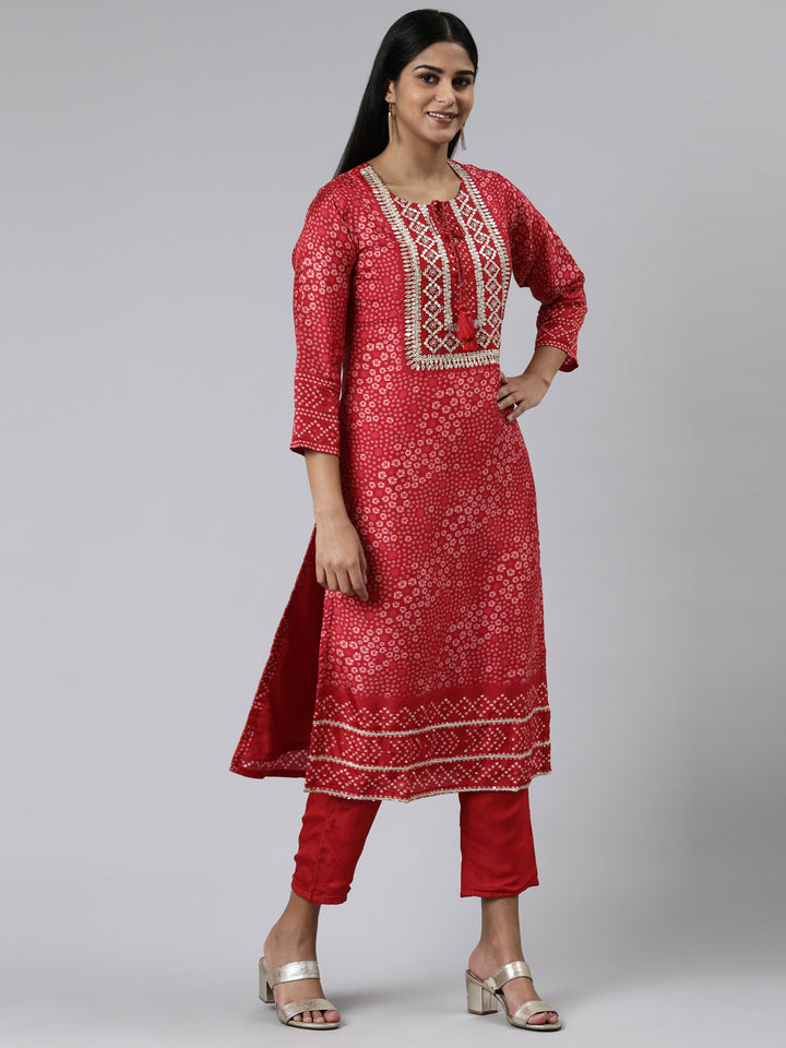 Neerus Red muslin printed kurta set with trouser and dupatta - back view