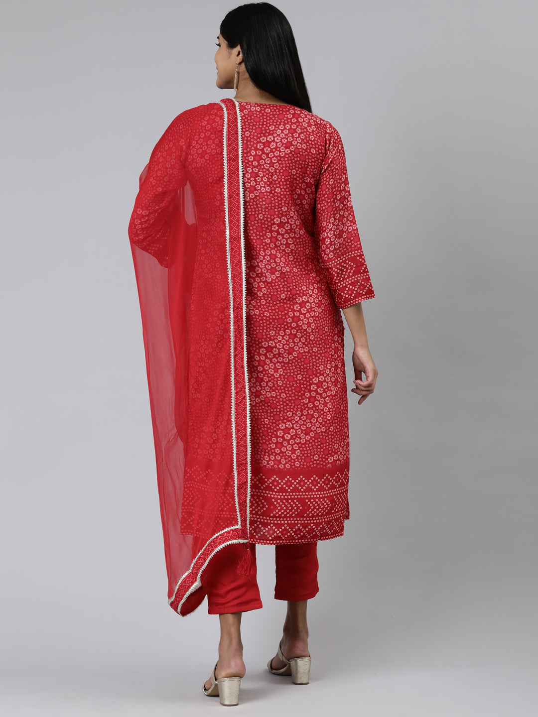Neerus Red muslin printed kurta set with trouser and dupatta - side view