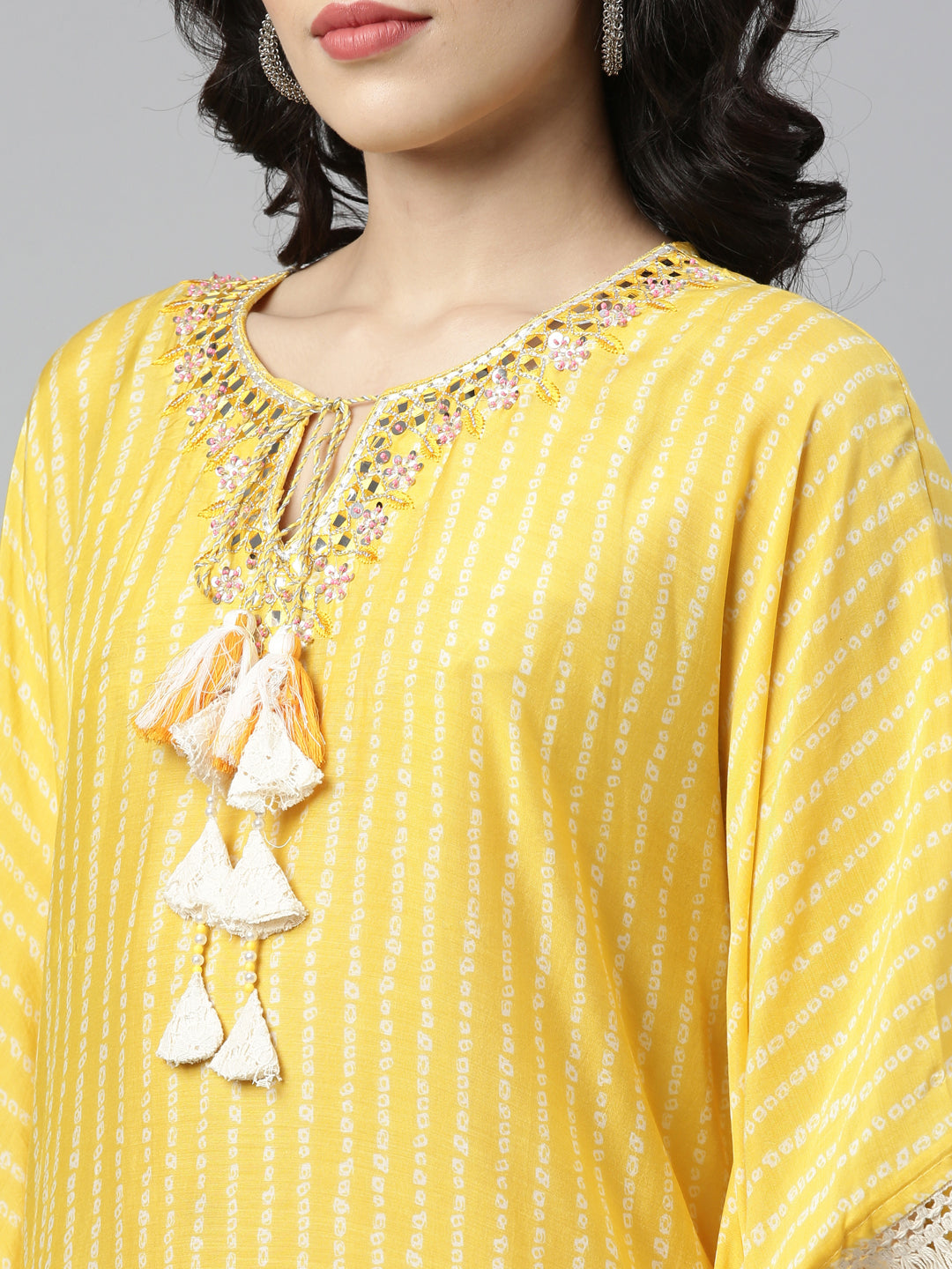 Neerus Yellow muslin mirror work kaftan kurti - side view
