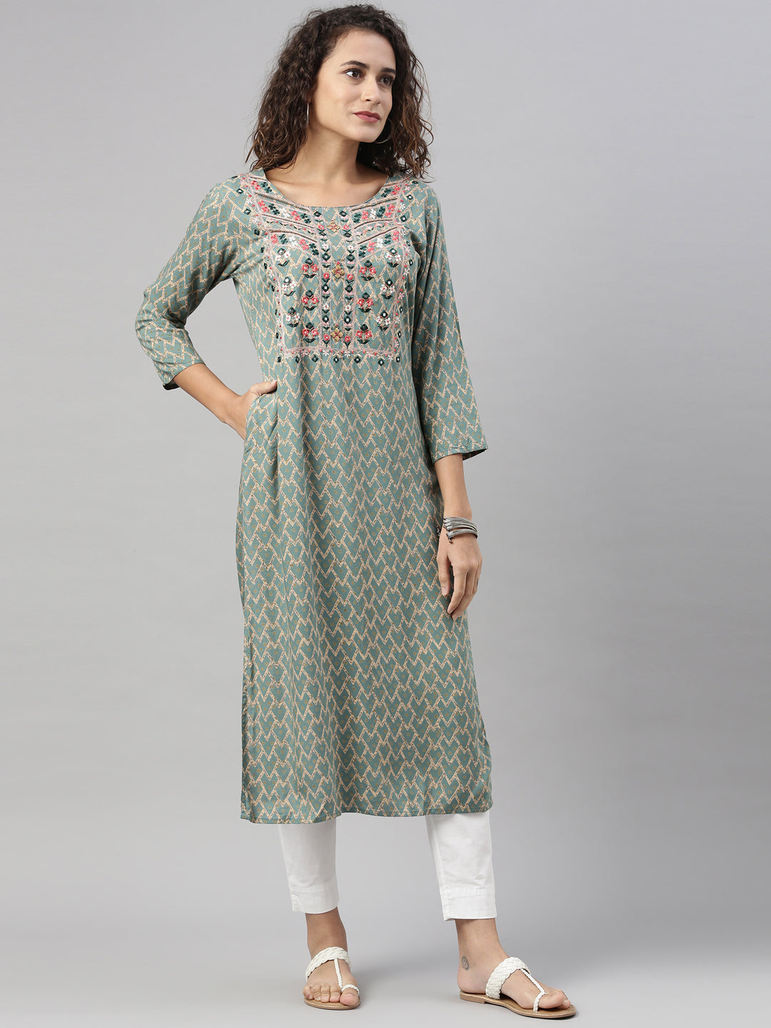 Neerus Green rayon embroidered kurti geometric print - front view