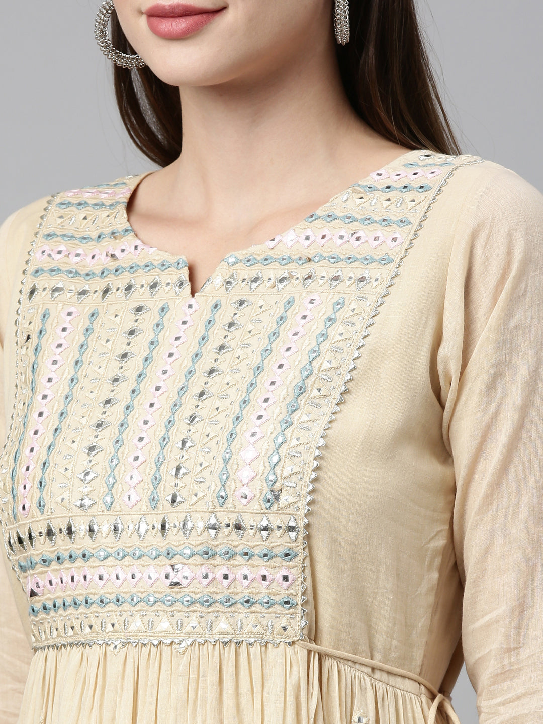 Neerus Beige cotton mirror work tiered kurti - side view