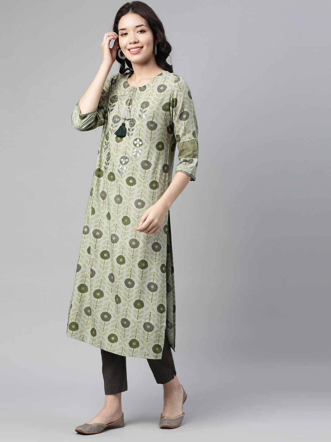 Neerus Green rayon mirror work kurti - front view