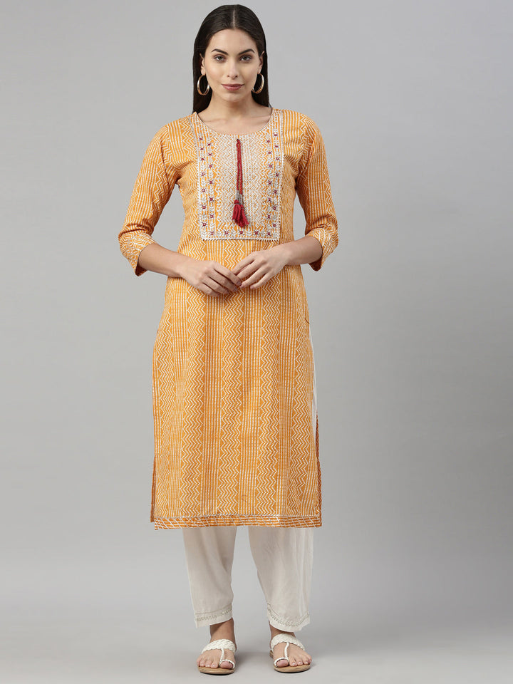 Neerus Yellow cotton mirror work kurta straight silhouette - front view
