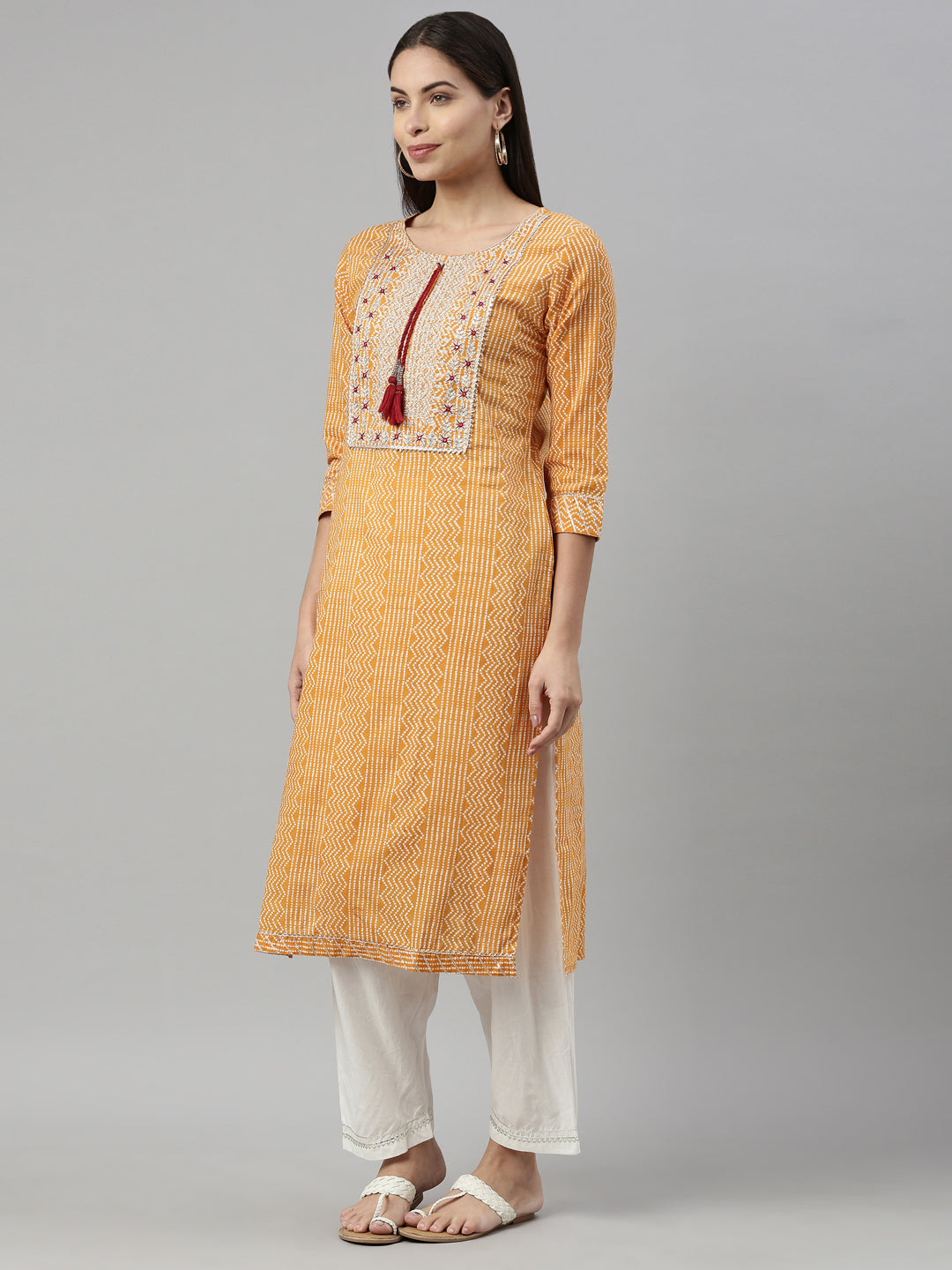 Neerus Yellow cotton mirror work kurta straight silhouette - side view