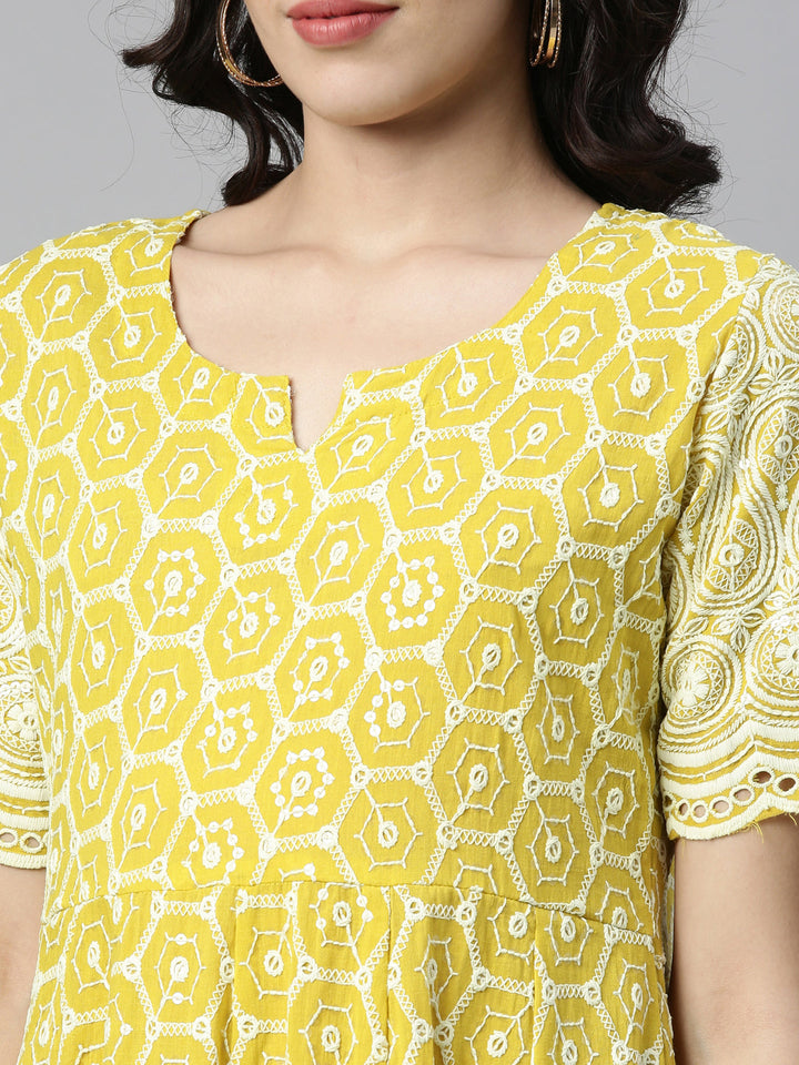 Neerus Yellow cotton chikankari anarkali kurti - side view