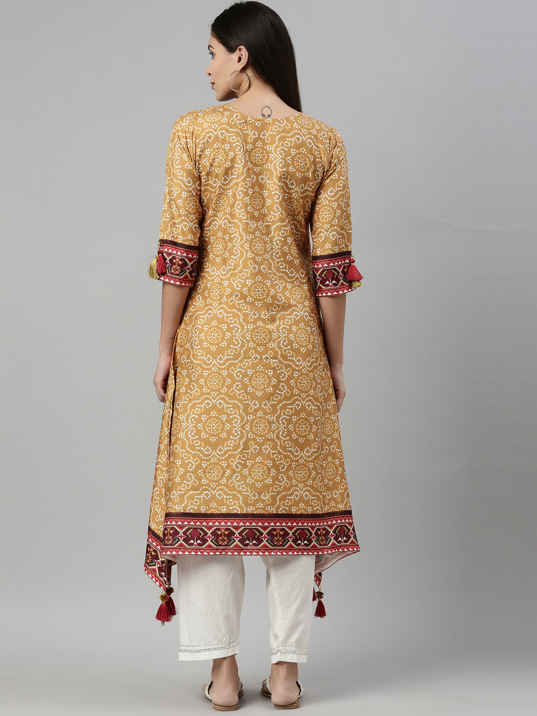 Neerus Yellow printed mirror work kurta keyhole neck - side view