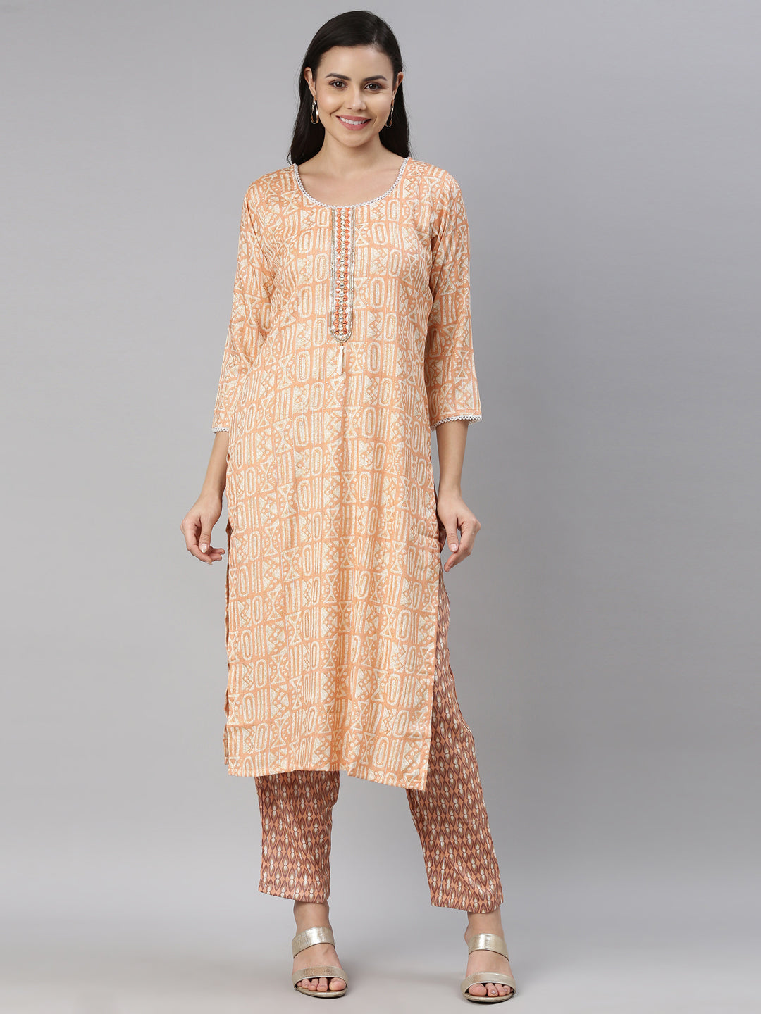 Neerus Orange rayon solid kurti - front view