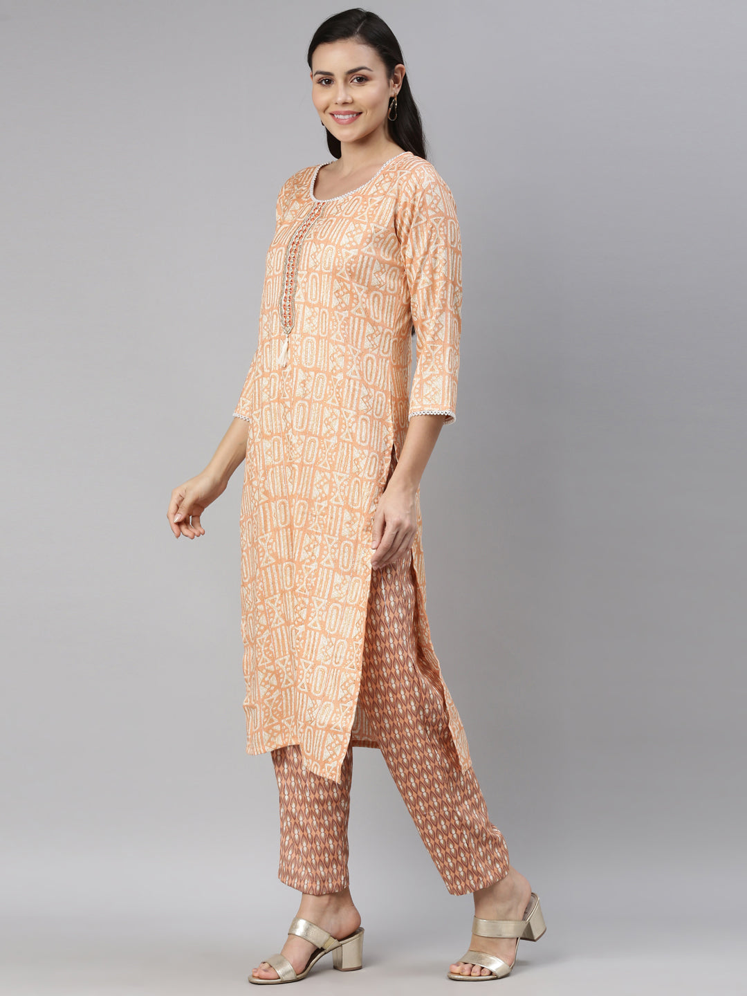 Neerus Orange rayon solid kurti - side view