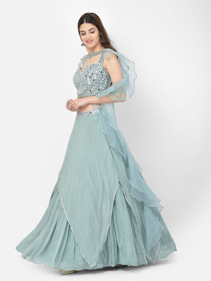 Neerus Green chiffon mirror work lehenga choli - back view
