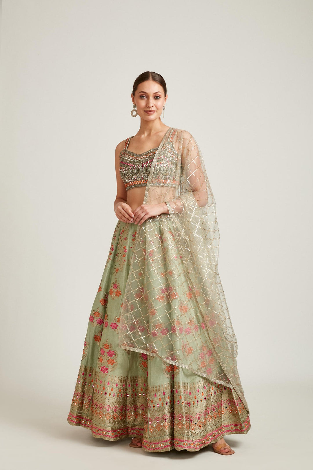 Neerus Green Banarasi woven lehenga choli set - front view