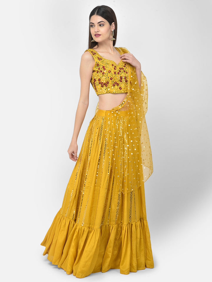 Neerus Yellow silk mirror work lehenga set - front view