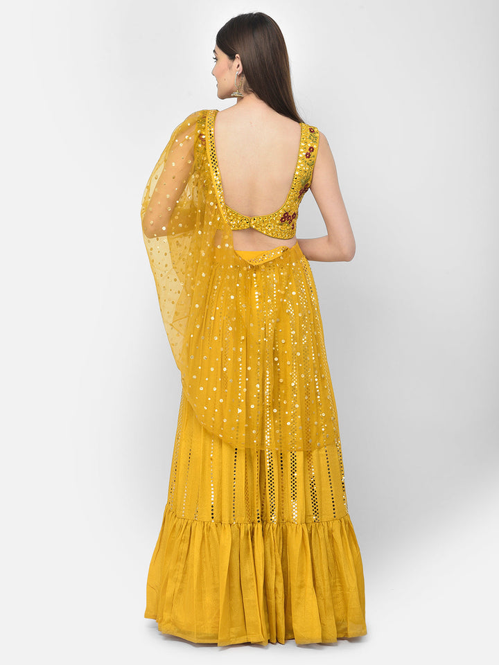 Neerus Yellow silk mirror work lehenga set - back view