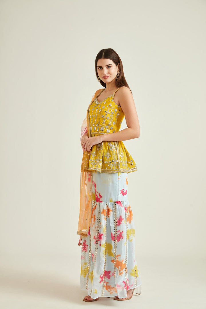 Neerus Yellow georgette mirror work kurta set - back view