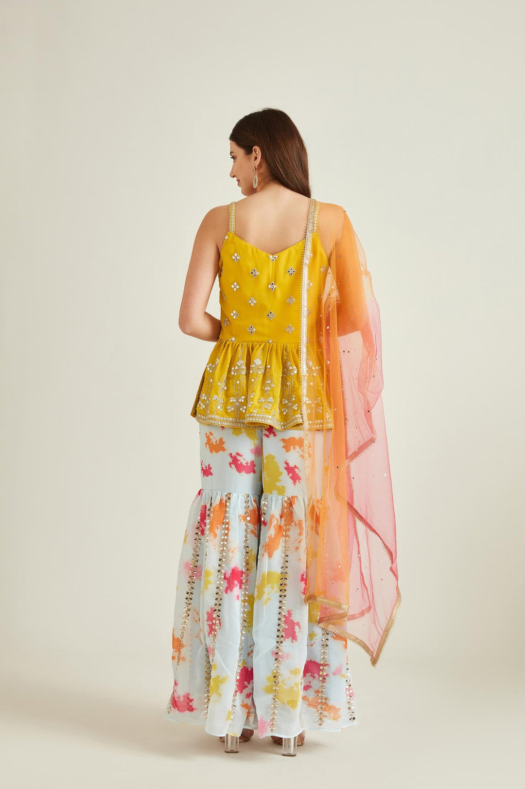 Neerus Yellow georgette mirror work kurta set - side view