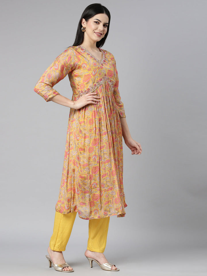 Neerus Yellow printed floral kurta set with trouser and dupatta - back view