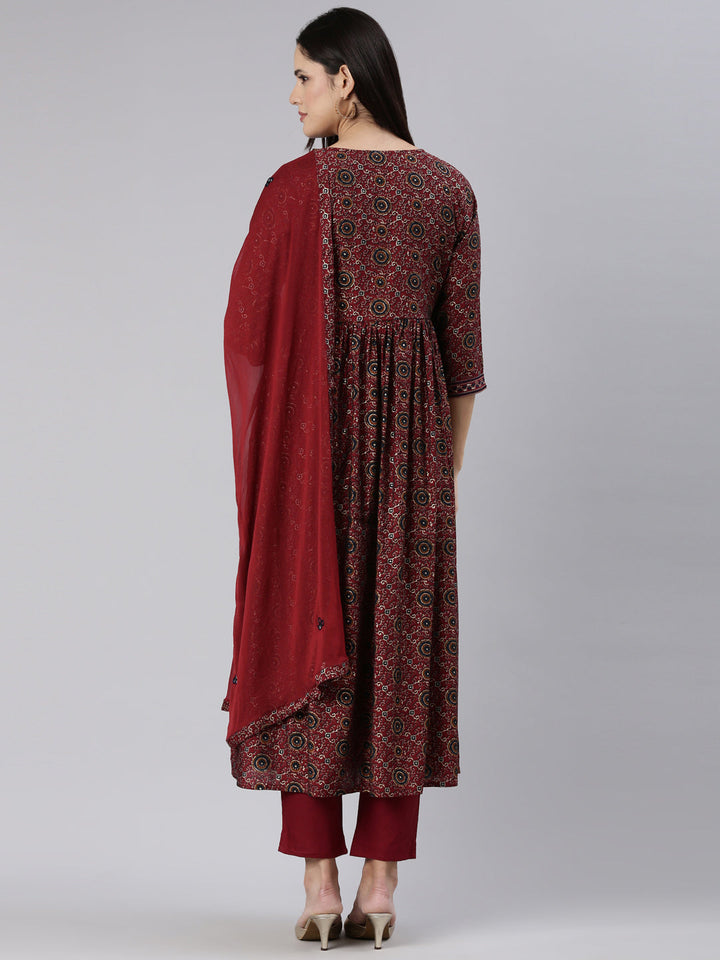 Neerus Maroon printed straight kurta set - side view