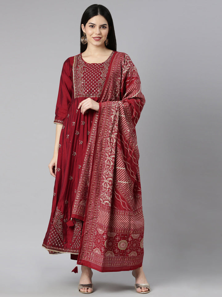 Neerus Maroon floral printed kurta set with trouser and dupatta - front view