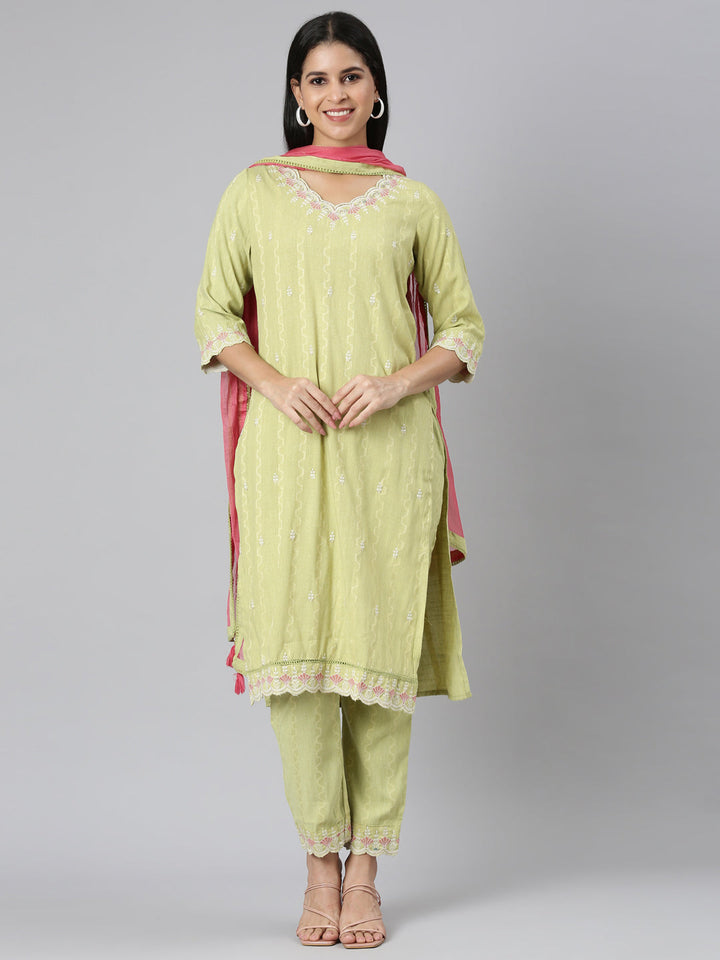 Neerus Green cotton thread embroidered kurta set - front view