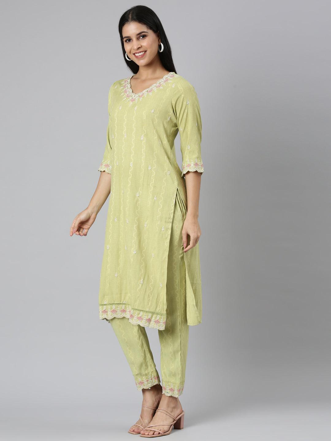 Neerus Green cotton thread embroidered kurta set - back view