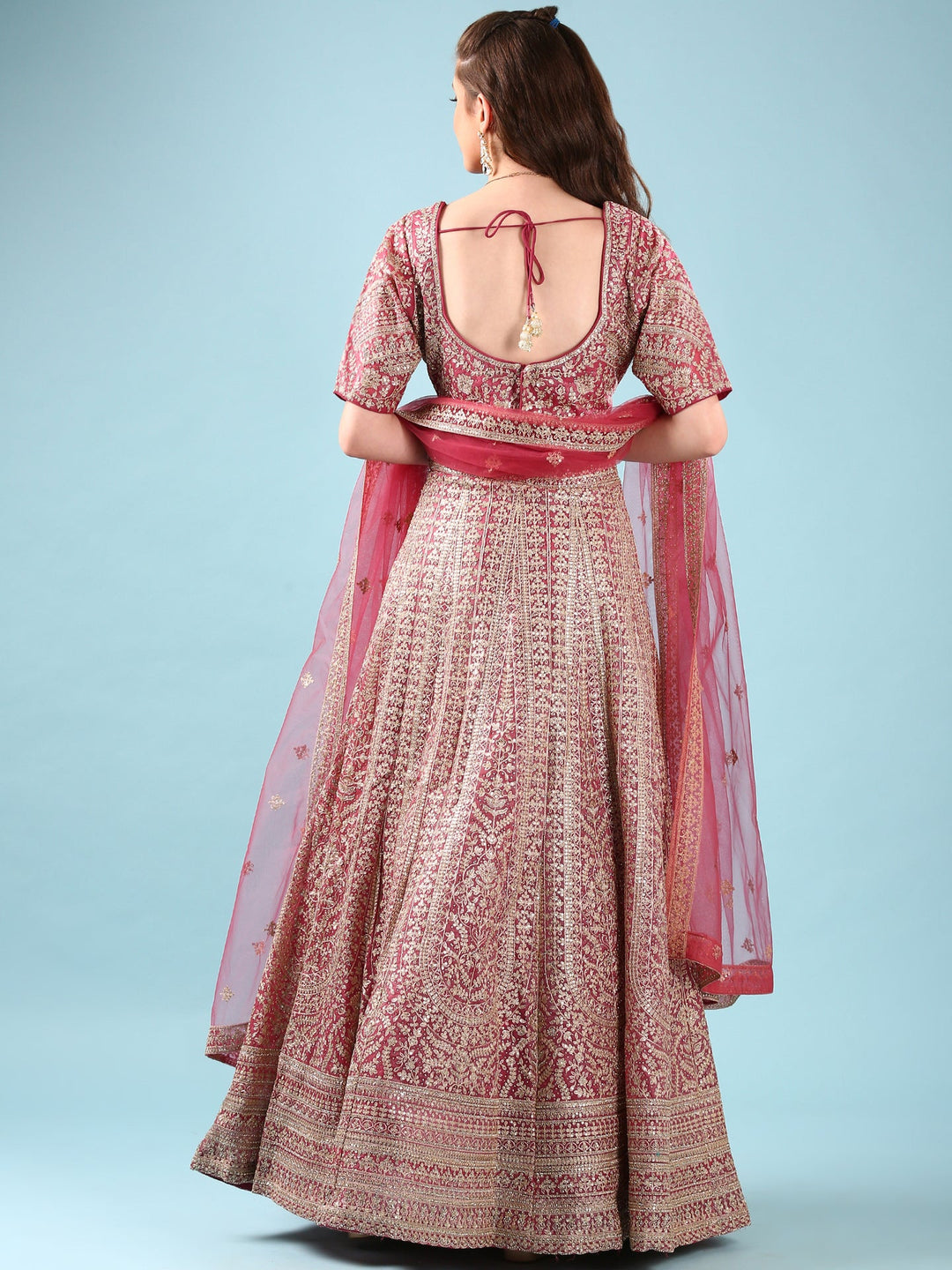 Neerus Pink net hand embroidered lehenga set - side view