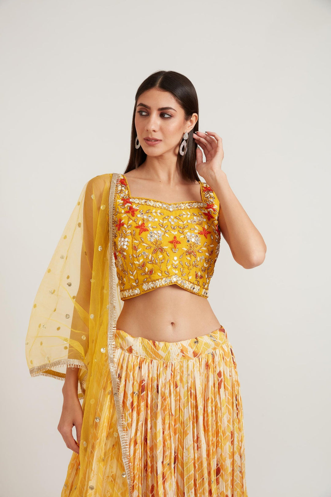Neerus Yellow georgette embellished lehenga set - side view