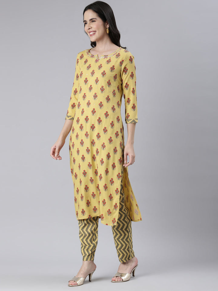 Neerus Yellow Rayon Solid Kurta Set with Trousers - back view