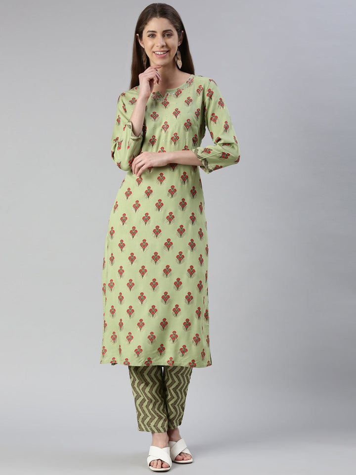 Neerus Green rayon solid kurta set - front view