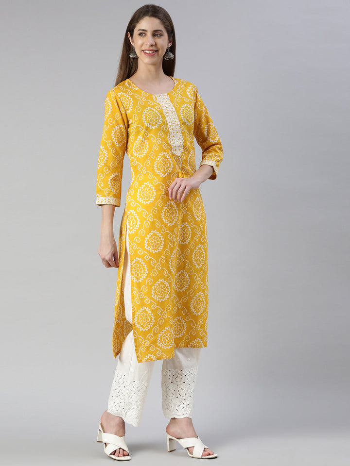 Neerus Yellow printed kurta set with palazzo and dupatta - back view