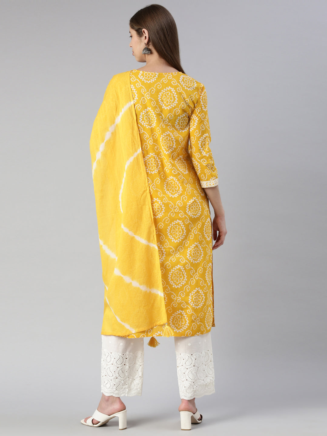 Neerus Yellow printed kurta set with palazzo and dupatta - side view